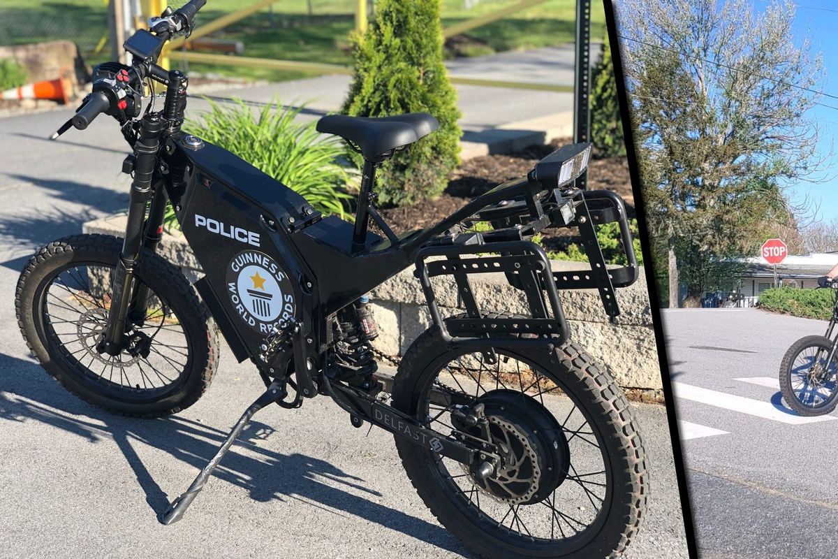 A Delfast TopCop police electric bike in POLICE livery, carrying the Guinness World Records badge